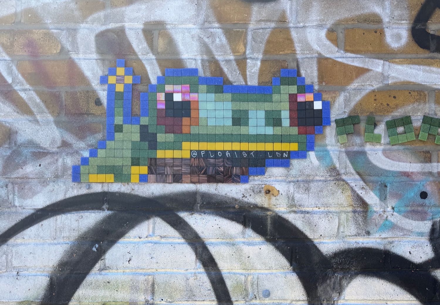 Shacklewell Street / Side of 'Ekol Food Centre' mosaic artwork in London