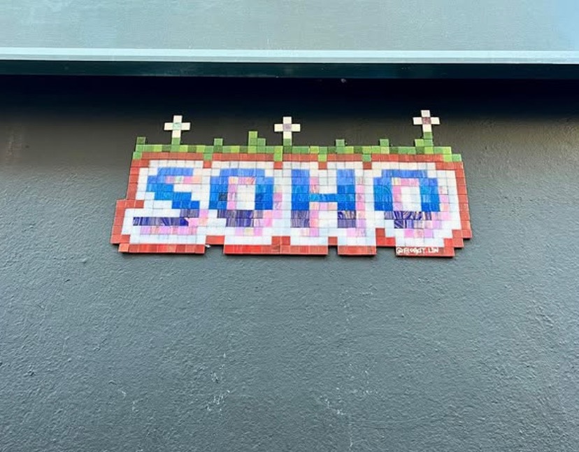 Peter Street Soho / Side of 'Supreme' mosaic artwork in London