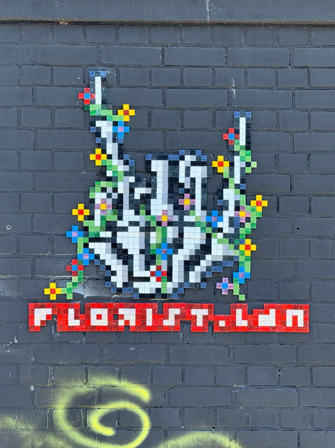 Turin Street / Side of 'Fuckoffee' mosaic artwork in London